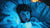 Surprised child sitting in bed after bedwetting – Oopsie Heroes helps kids wake up dry and confident.